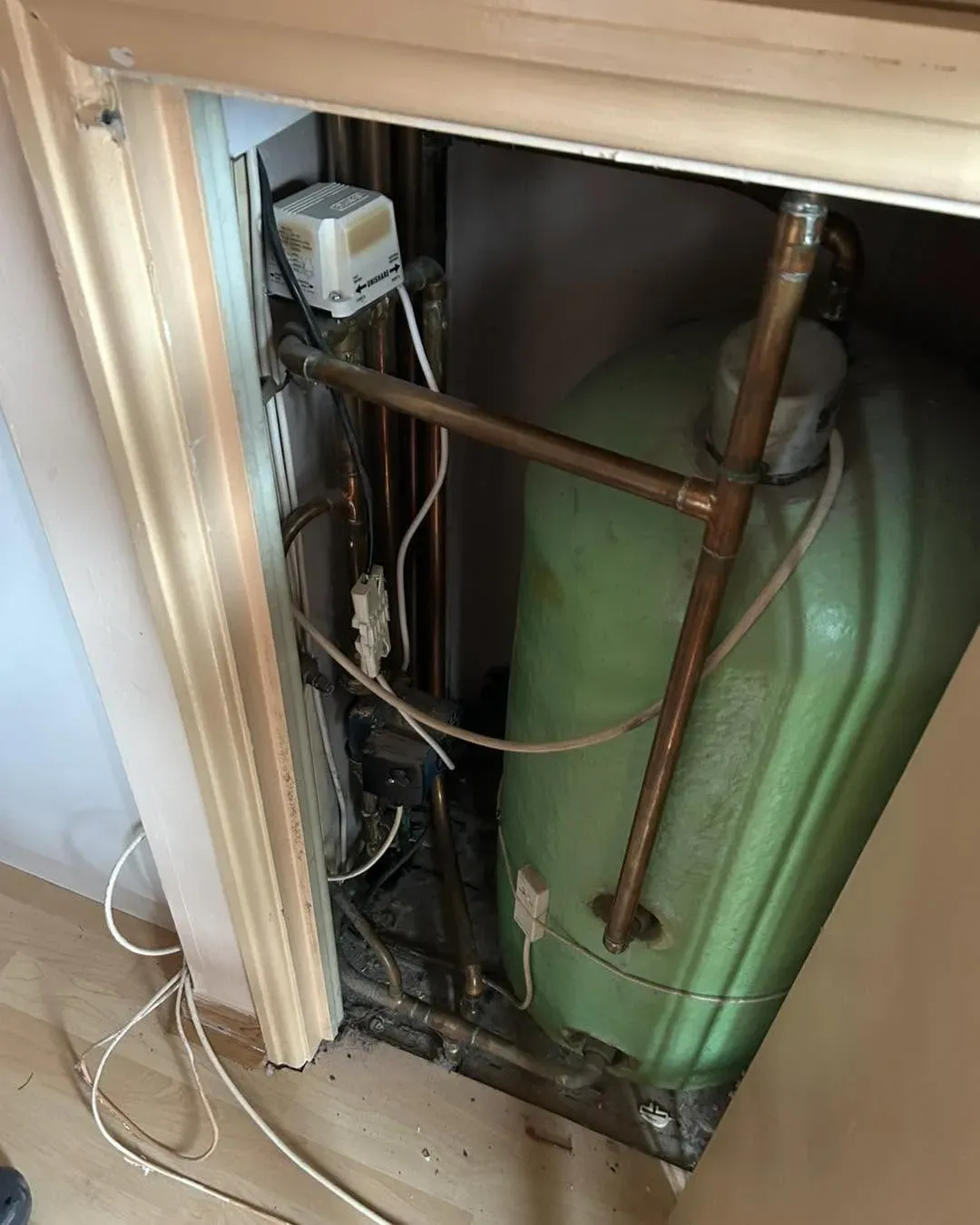 Domestic heating pipework in an airing cupboard