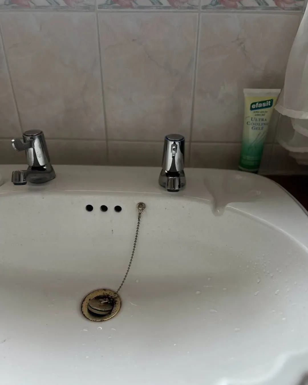 Bathroom basin taps after replacement