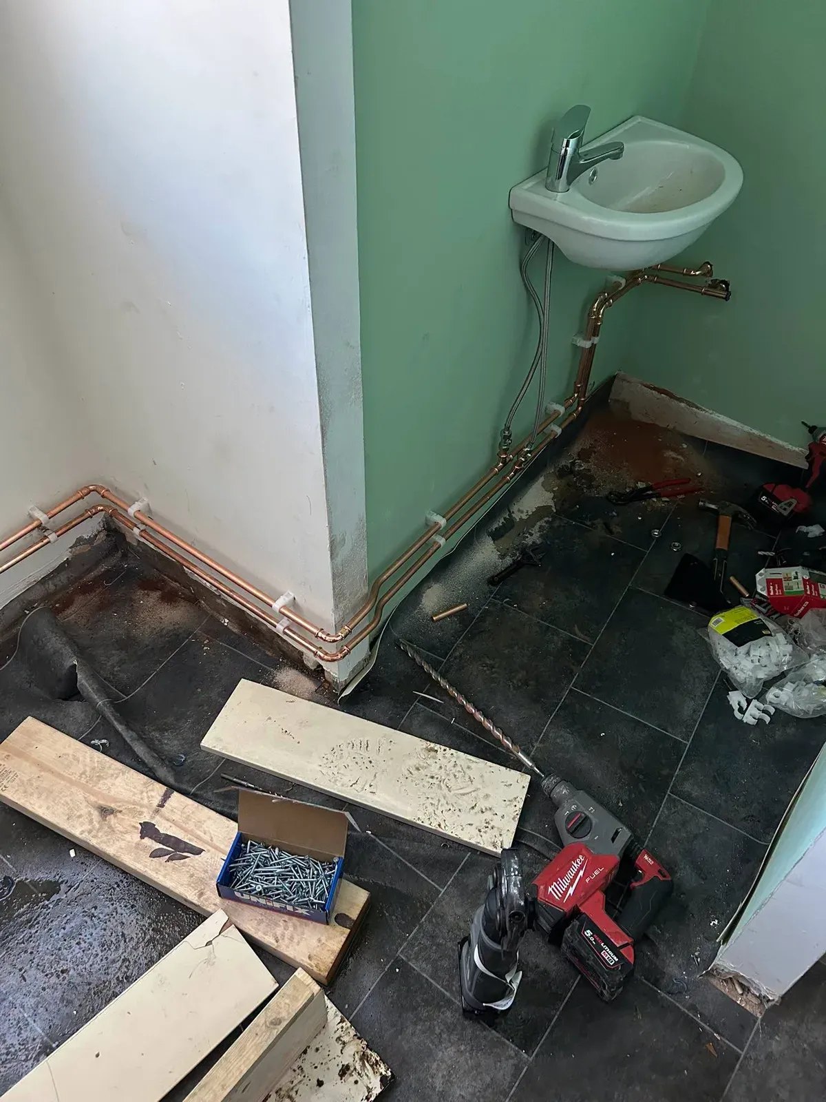 Bathroom basin pipework during renovation