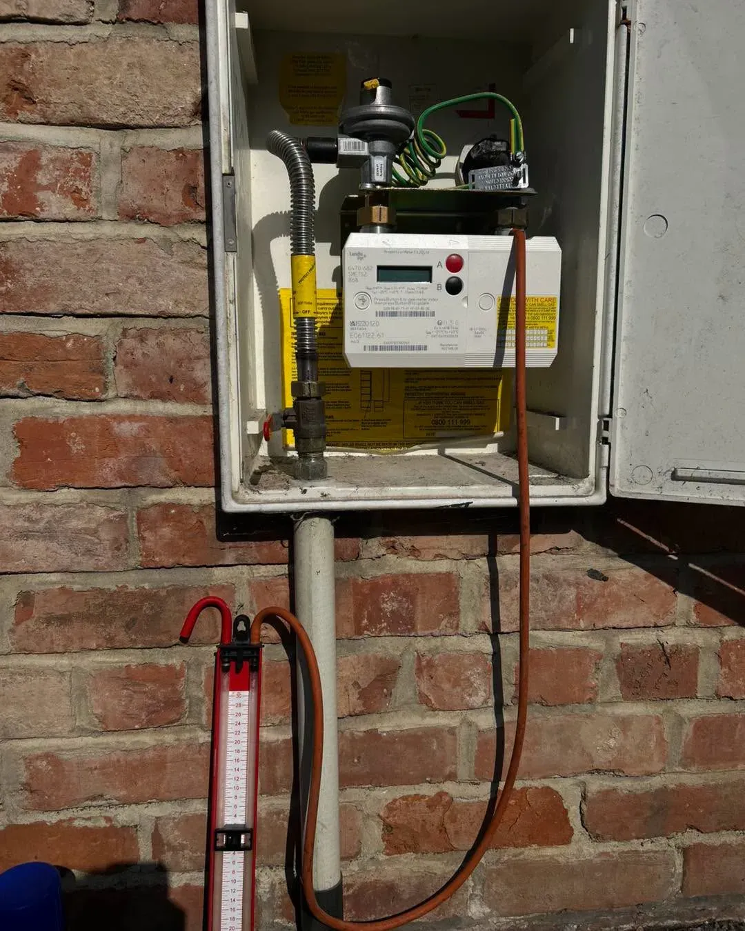 Gas meter being tested with professional equipment