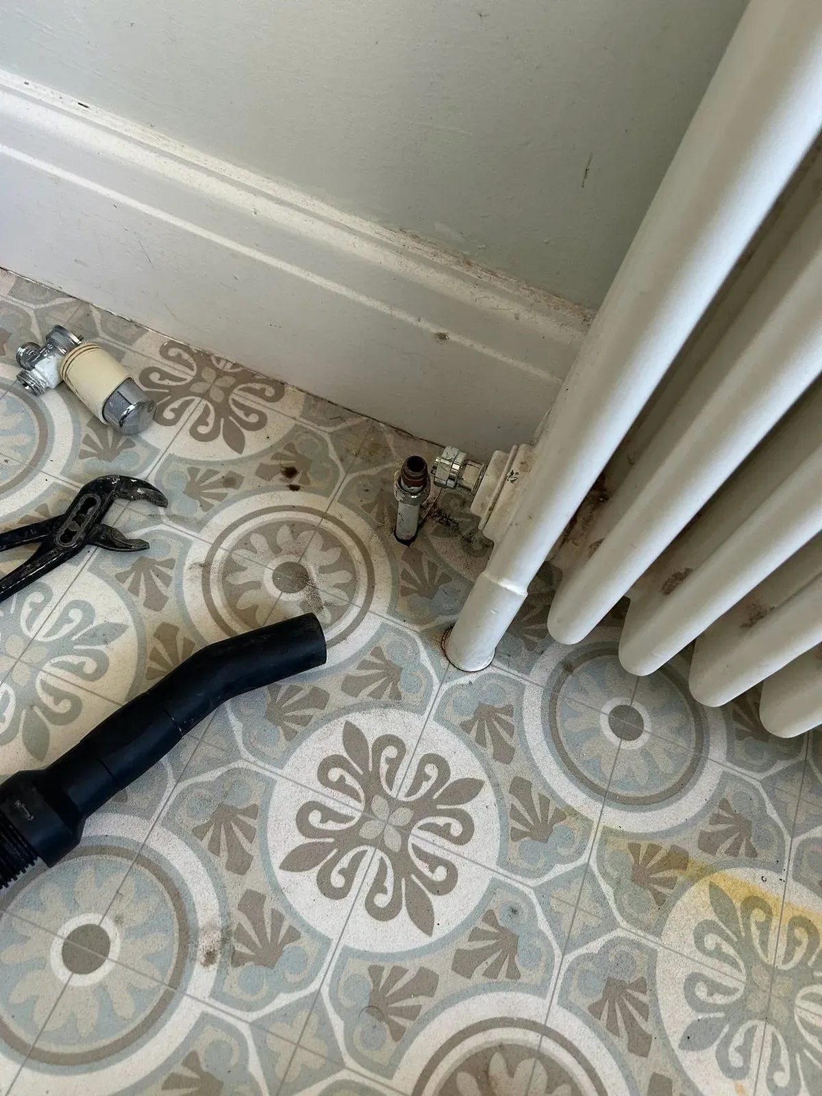 Radiator valve and pipework during heating maintenance